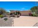 Beautiful single-story home featuring desert landscaping and a spacious two-car garage at 11099 E Desert Vista Dr, Scottsdale, AZ 85255