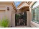 Close-up of custom entry gate with unique desert themed metal work at 11187 E De La O Rd, Scottsdale, AZ 85255