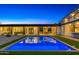 Stunning backyard pool with modern architecture and spacious outdoor living area at 11649 N Miller Rd, Scottsdale, AZ 85260