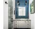 Contemporary bathroom featuring blue tiled wall, modern vanity, and glass enclosed shower at 11649 N Miller Rd, Scottsdale, AZ 85260
