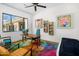 Bright bedroom with a large window, desk, and modern decor at 11649 N Miller Rd, Scottsdale, AZ 85260