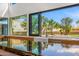 Modern kitchen featuring sleek countertops, stainless steel appliances, and ample natural light at 11649 N Miller Rd, Scottsdale, AZ 85260