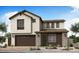 Modern two-story home featuring a brick facade, dark garage door, and stylish architectural details at 1481 E Prescott St, Gilbert, AZ 85298