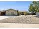 Charming single-story home with desert landscaping and a welcoming facade at 153 W Hillside St, Mesa, AZ 85201