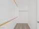 Walk-in closet with shelving for storage and organization at 16585 W Tonto St, Goodyear, AZ 85338