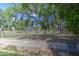 Large backyard with grass, large tree and view of park at 1720 W Orchid Ln, Chandler, AZ 85224