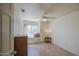 Bright bedroom with ample natural light, ceiling fan, and wood-look flooring at 1720 W Orchid Ln, Chandler, AZ 85224