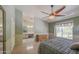Spacious primary bedroom offers ensuite bathroom access and plenty of natural light at 1720 W Orchid Ln, Chandler, AZ 85224