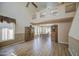 Bright living room with a high ceiling, wood floors and large windows at 1720 W Orchid Ln, Chandler, AZ 85224