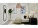 Stylish bedroom featuring a decorative plant and mirror, enhancing the room's ambiance and aesthetic appeal at 20900 S 231St Way, Queen Creek, AZ 85142