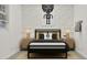 Modern bedroom featuring quirky wallpaper and stylish nightstands, creating a fun and inviting space at 20900 S 231St Way, Queen Creek, AZ 85142