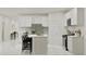 Bright, spacious kitchen featuring sleek cabinetry, stainless steel appliances and an island with seating at 20900 S 231St Way, Queen Creek, AZ 85142