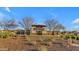 Welcoming Victoria community entrance showcasing landscaping and architectural features at 21325 S 201St Way, Queen Creek, AZ 85142