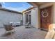 Inviting courtyard space featuring comfortable seating, string lights, and outdoor access at 21325 S 201St Way, Queen Creek, AZ 85142