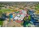 Aerial view of the community pool, golf course and parking lot at 2623 E Marcos Dr, Casa Grande, AZ 85194