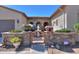 Beautiful courtyard with stone planters, wrought-iron gate, and a central fountain at 2623 E Marcos Dr, Casa Grande, AZ 85194
