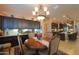Dining room with chandelier and dark wood cabinetry at 2623 E Marcos Dr, Casa Grande, AZ 85194