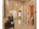 Entryway showcases a tiled floor, decorative pieces, and access to half-bath and living spaces at 2623 E Marcos Dr, Casa Grande, AZ 85194