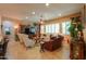Open living room with a ceiling fan, recessed lighting, and plenty of seating at 2623 E Marcos Dr, Casa Grande, AZ 85194