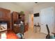 Spacious office area with natural light, custom desk, and ample cabinet space at 2623 E Marcos Dr, Casa Grande, AZ 85194