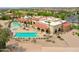 A beautiful community pool featuring lounge chairs, well-maintained landscaping, and a relaxing atmosphere at 2623 E Marcos Dr, Casa Grande, AZ 85194