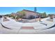 Street corner view of a neighborhood with sidewalks and desert landscaping at 2623 E Marcos Dr, Casa Grande, AZ 85194