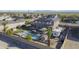 This property features a refreshing pool, a relaxing gazebo, an RV parking space and eco-friendly solar panels at 31918 N Caspian Way, San Tan Valley, AZ 85143