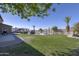 Spacious backyard features a pool, spa, gazebo, and ample green space, creating an entertainer's dream at 31918 N Caspian Way, San Tan Valley, AZ 85143