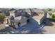 Impressive two-story home showcasing architectural detail, a well-manicured lawn, and a spacious driveway at 31918 N Caspian Way, San Tan Valley, AZ 85143
