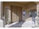 Covered entryway with double doors and side windows for natural light at 31918 N Caspian Way, San Tan Valley, AZ 85143