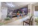 Open kitchen with granite countertops, an island, and bar seating at 31918 N Caspian Way, San Tan Valley, AZ 85143