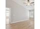 Bright bedroom with wood-look flooring, neutral paint, and large window for natural light at 3321 N Silverado --, Mesa, AZ 85215