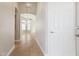 Bright entryway with an arched doorway, wood-look flooring, and neutral color scheme at 3321 N Silverado --, Mesa, AZ 85215