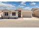 Charming single-story home with desert landscaping, inviting entry, and attached two-car garage at 3321 N Silverado --, Mesa, AZ 85215