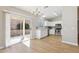 Charming kitchen with stainless appliances, white cabinets, and a backyard view through a sliding door at 3321 N Silverado --, Mesa, AZ 85215