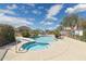 Community pool with spa, waterfall feature and lush landscaping, perfect for relaxing and enjoying the outdoors at 3321 N Silverado --, Mesa, AZ 85215
