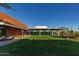 Lush green community lawn area with desert landscaping, modern architecture and inviting atmosphere at 3911 E Rockingham Rd, Phoenix, AZ 85050