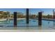 Stunning community pool featuring decorative pillars and ample seating areas for relaxation at 3911 E Rockingham Rd, Phoenix, AZ 85050