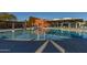 Beautiful community pool featuring multiple lounge chairs, shaded seating and desert landscaping at 3911 E Rockingham Rd, Phoenix, AZ 85050