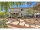 Expansive backyard featuring desert landscaping, a covered patio, and ample room for outdoor enjoyment at 3932 W Rene Dr, Chandler, AZ 85226
