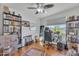 Functional bedroom with hardwood floors and lots of desk and bookshelf space at 3932 W Rene Dr, Chandler, AZ 85226