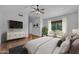 Large main bedroom with ample space, large window, and bright, neutral decor at 3932 W Rene Dr, Chandler, AZ 85226