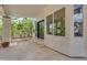 Relaxing outdoor patio with stone flooring and lush greenery, creating a perfect retreat at 3932 W Rene Dr, Chandler, AZ 85226