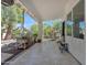 Stylish covered patio with tile flooring, offering a tranquil outdoor space with views of the yard at 3932 W Rene Dr, Chandler, AZ 85226