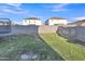 This large backyard features a trampoline and block wall fence, perfect for outdoor activities at 40613 N Jerlyn Pl, San Tan Valley, AZ 85140