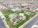 This aerial view captures the many recreational opportunities offered in this community including a pool, playground, and basketball court at 4164 E Bernice St, Gilbert, AZ 85295