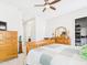 Bedroom featuring wood furniture set and access to walk-in closet at 4164 E Bernice St, Gilbert, AZ 85295