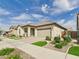 Inviting single-Gathering home with a two-car garage, covered entryway, and desert-style landscaping at 4164 E Bernice St, Gilbert, AZ 85295