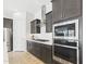 Close up of the kitchen appliances and gray cabinets with white subway tile backsplash at 4164 E Bernice St, Gilbert, AZ 85295