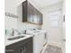 Laundry room with cabinetry and sink at 4164 E Bernice St, Gilbert, AZ 85295